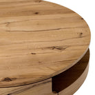 Close up of Four Hands Matheus Coffee Table in Natural Reclaimed French Oak on a white background