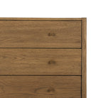 Close up of Four Hands Meadow 5 Drawer Dresser on a white background