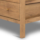 Close up of Four Hands Meadow 5 Drawer Dresser on a white background