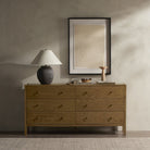 Four Hands Meadow 6 Drawer Dresser in a modern bedroom