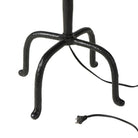 Close up of Four Hands Neville Floor Lamp in Matte Black Cast Aluminum on a white background