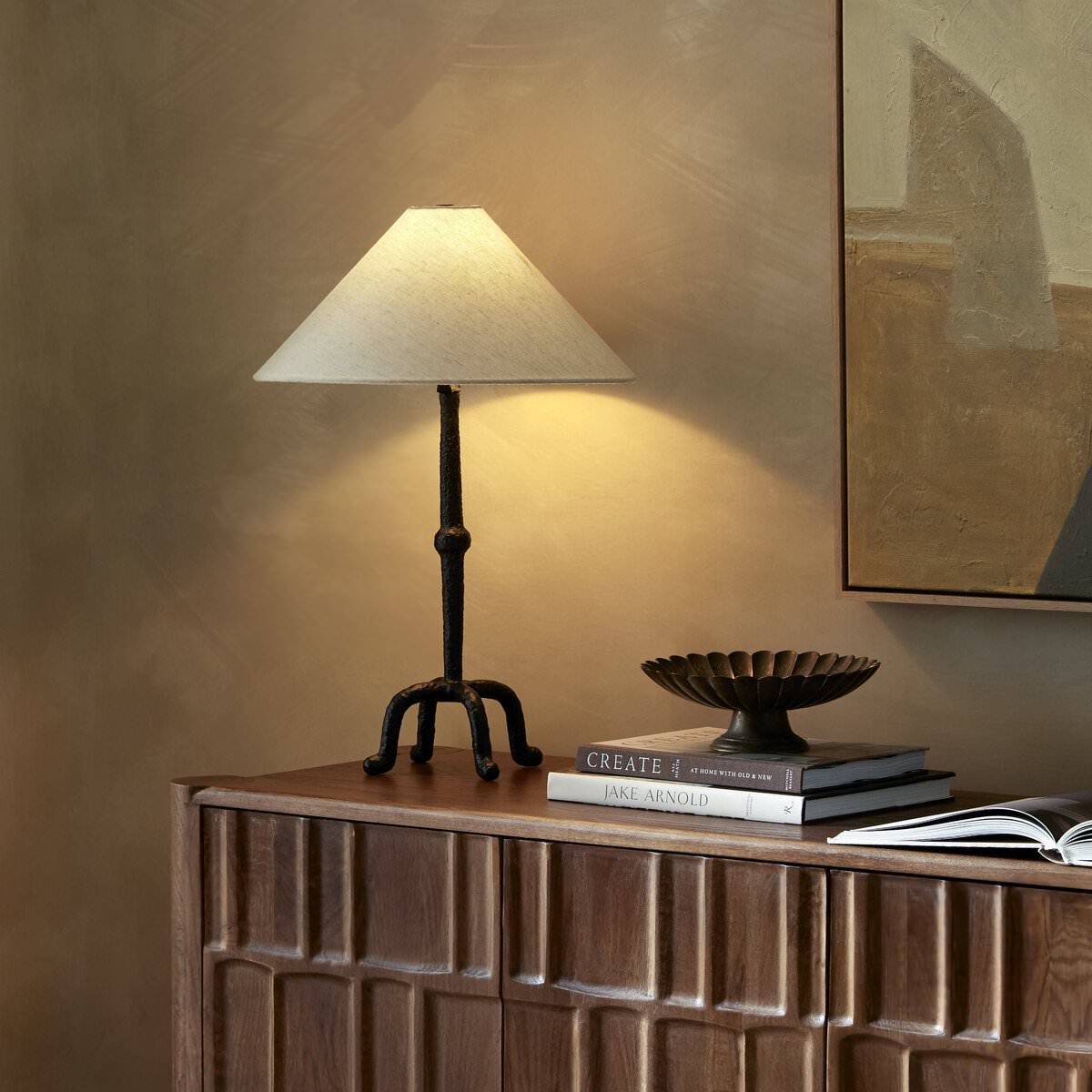 Four Hands Neville Table Lamp in Matte Black Cast Aluminum in a modern neutral living room at Addison West