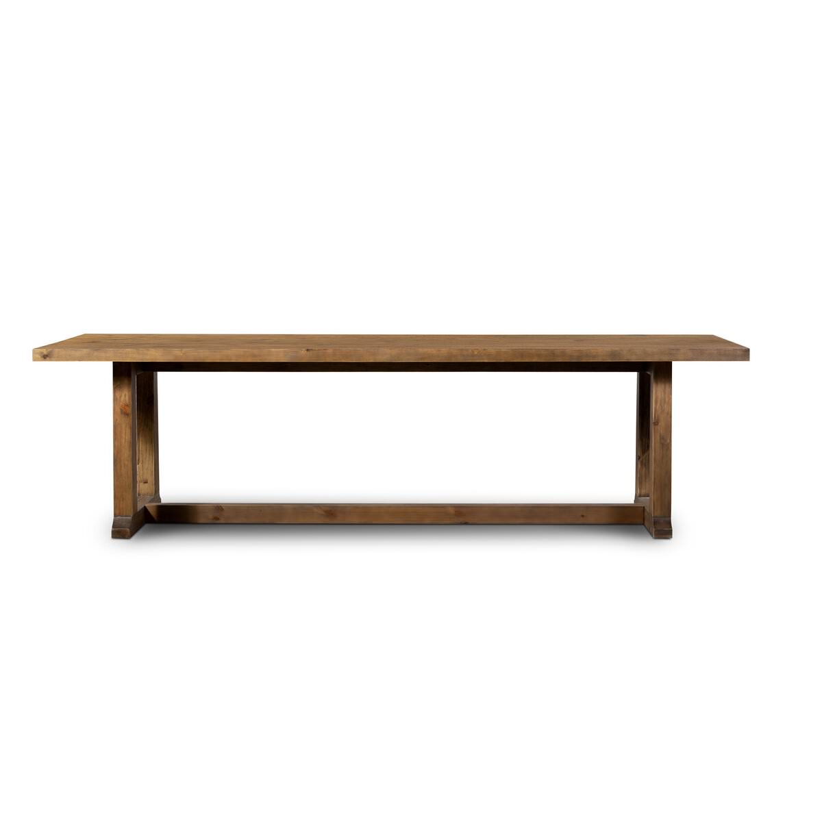 Four Hands Otto Dining Table 110" in Honey Pine on a white background