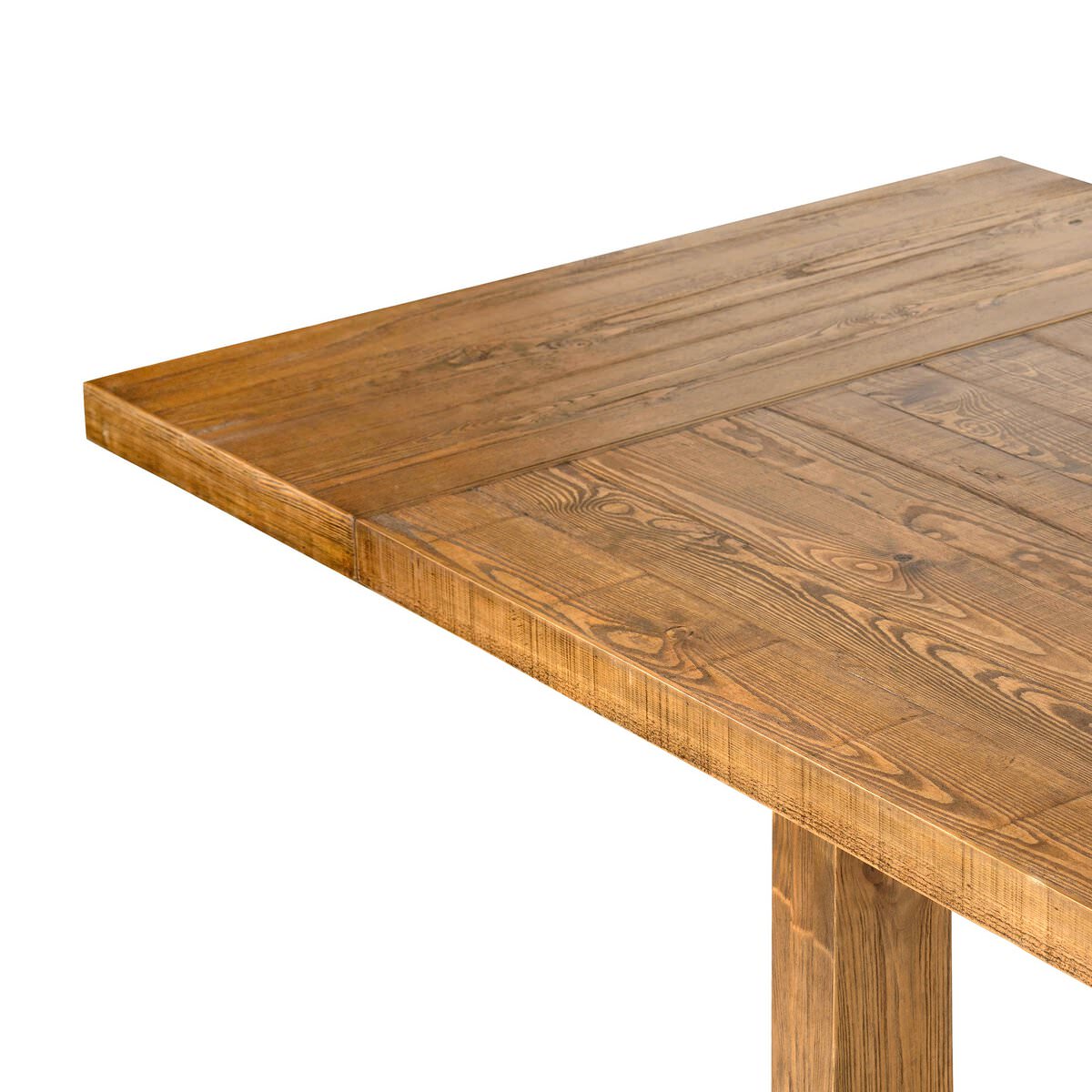 Close up of Four Hands Otto Extension Dining Table 86"-120" in Honey Pine on a white background