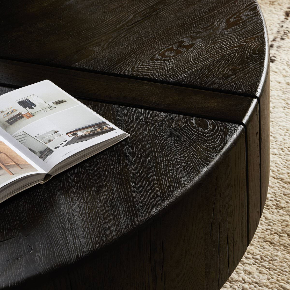 Close up of Four Hands Renan Coffee Table Dark Espresso Reclaimed French Oak in a living room