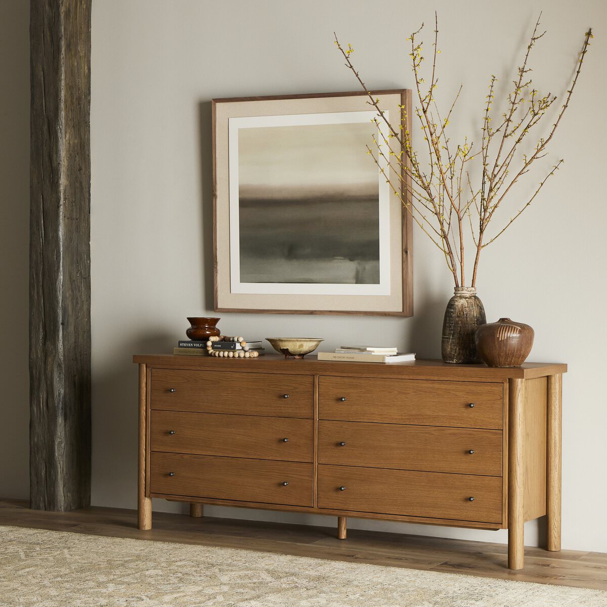 Four Hands Roark 6 Drawer Dresser in Amber Oak Veneer in a modern farmhouse