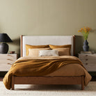 Four Hands Roark Bed in Essence Natural in a bedroom with green walls