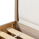 Close up of Four Hands Rosedale Bed in Knoll Natural on a white background