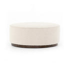 Four Hands Sinclair Large Round Ottoman in Knoll Natural on a white background at Addison West