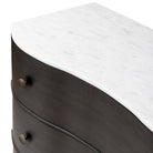 Close up of Four Hands Tiago Marble Chest in Distressed Black on a white background