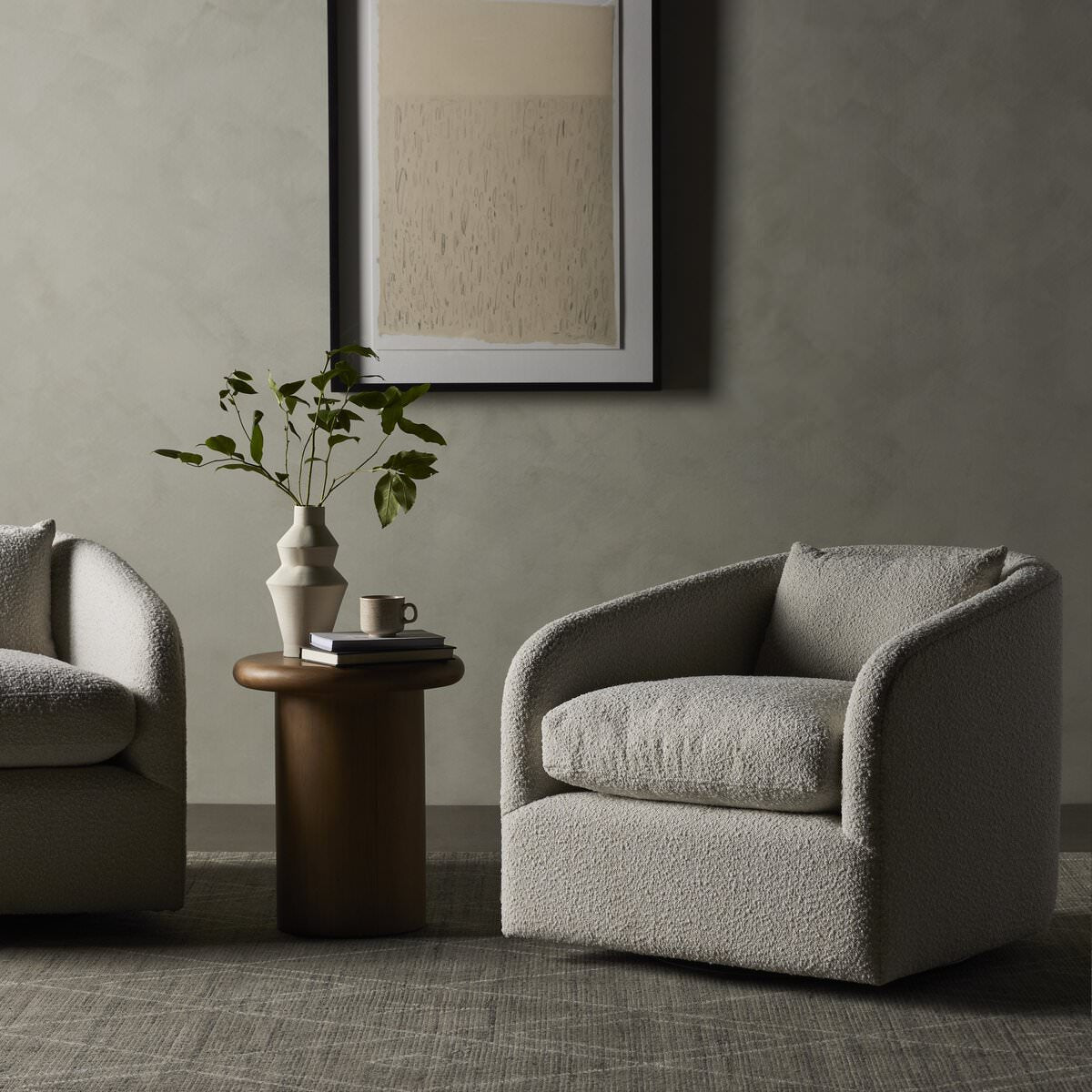 Four Hands Topanga Swivel Chair in Knoll Natural in a dark neutral living room