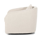 Side of Four Hands Topanga Swivel Chair in Knoll Natural on a white background