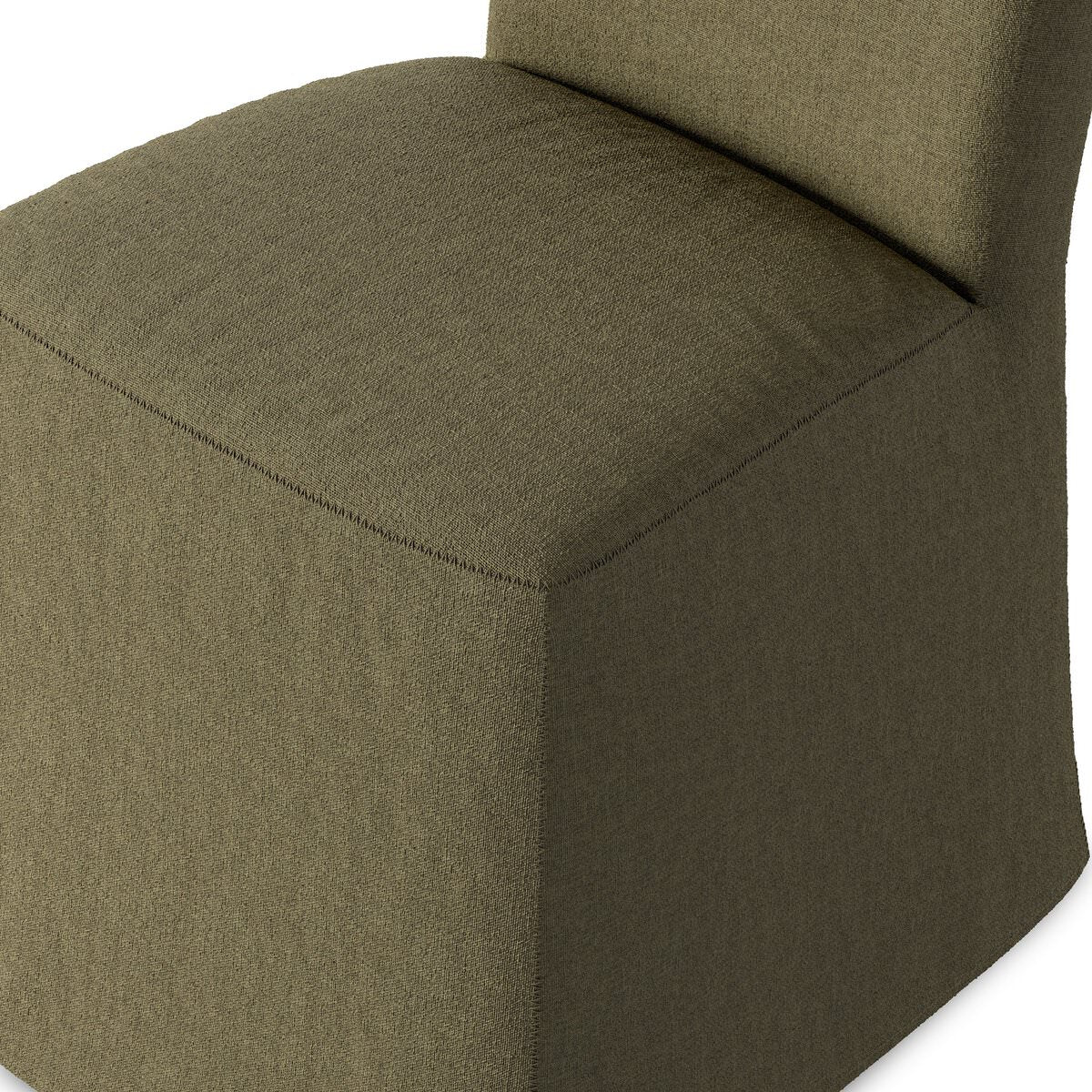 Close up of Four Hands Vista Slipcovered Dining Chair in Broadway Olive on a white background