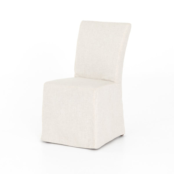 Four Hands Vista Slipcovered Dining Chair in Savile Flax on a white background