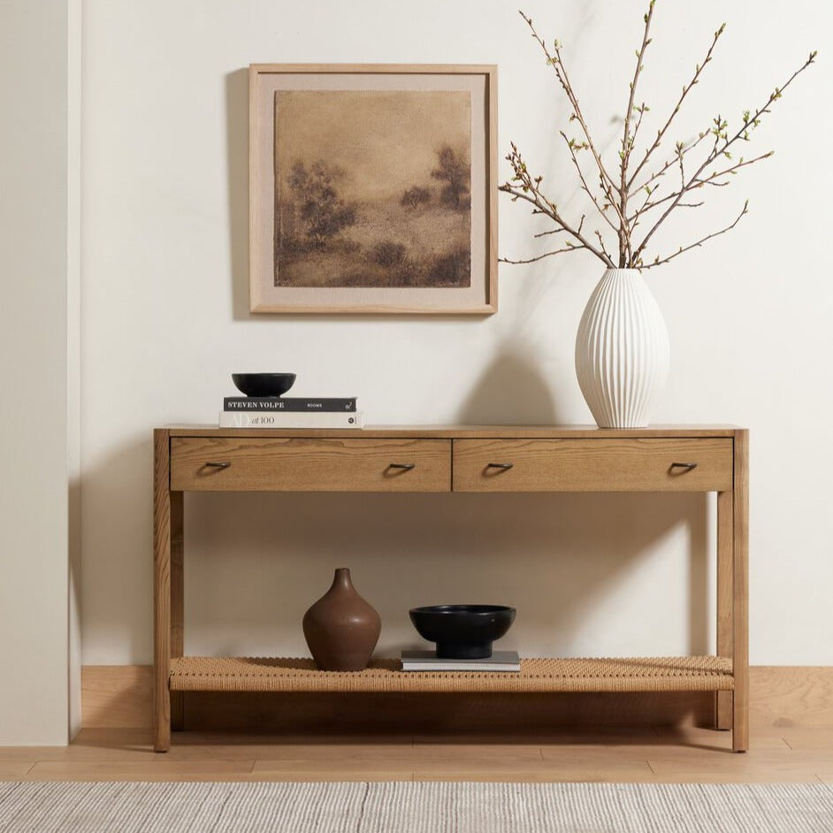 Four Hands Zuma Console in Dune Ash in a neutral room with white walls