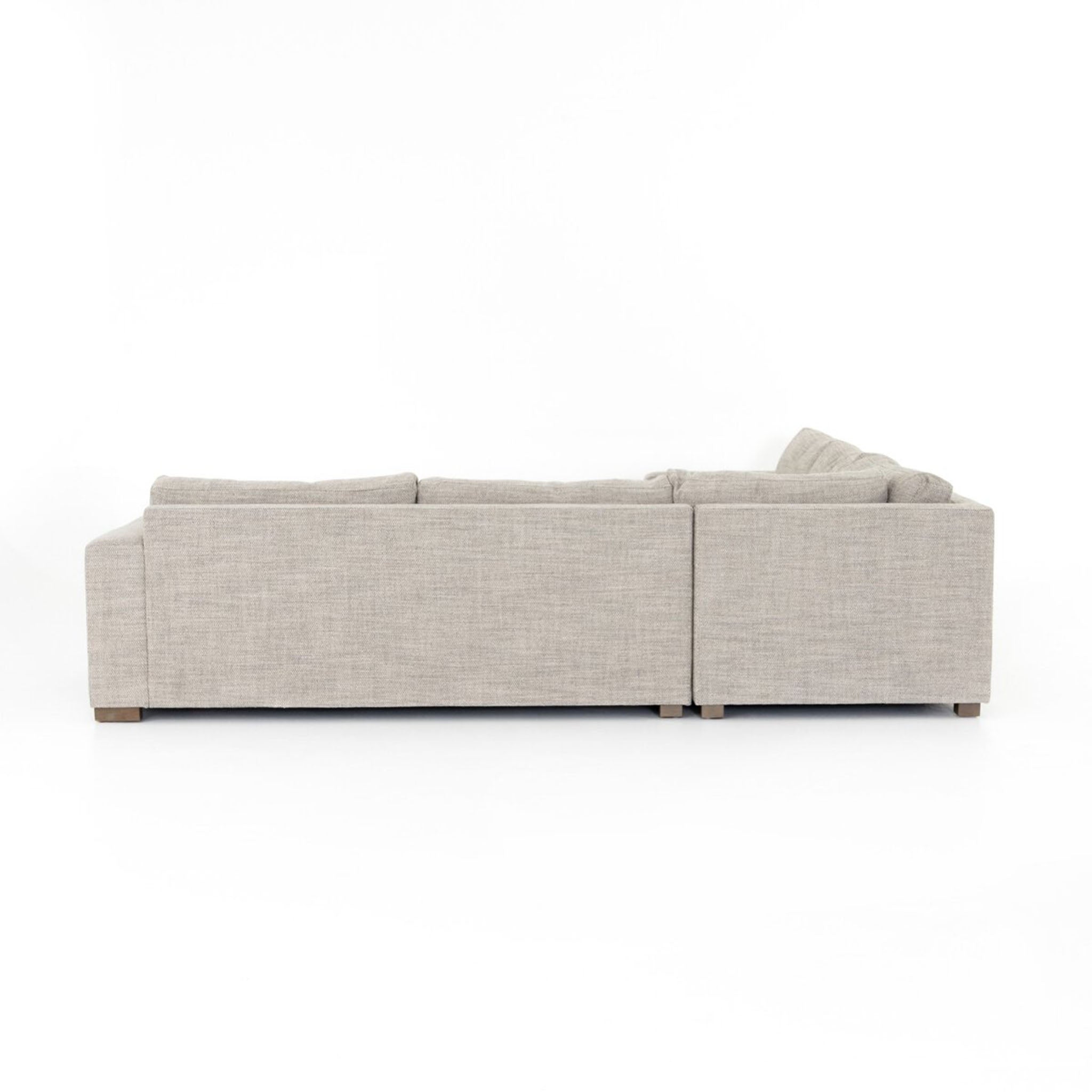 Back of Four Hands Boone Small 3-Piece Sectional in Thames Coal on a white background