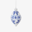 Glass Delft Ornament with blue and white painting in a teardrop shape on a white background