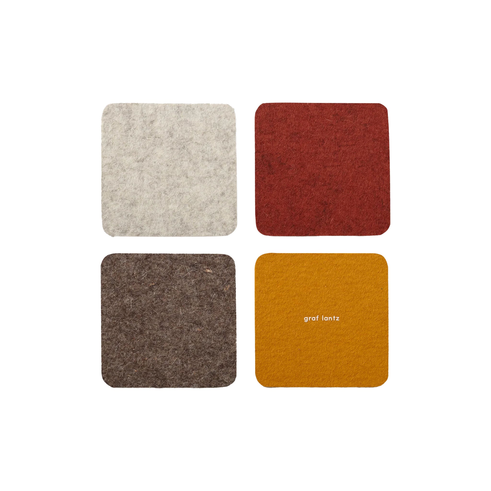 Graf Lantz Square Coaster Set in Desert Sun on a white background