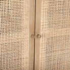 Close up of Grier Light Brown Solid Wood with Cane Sideboard on a white background