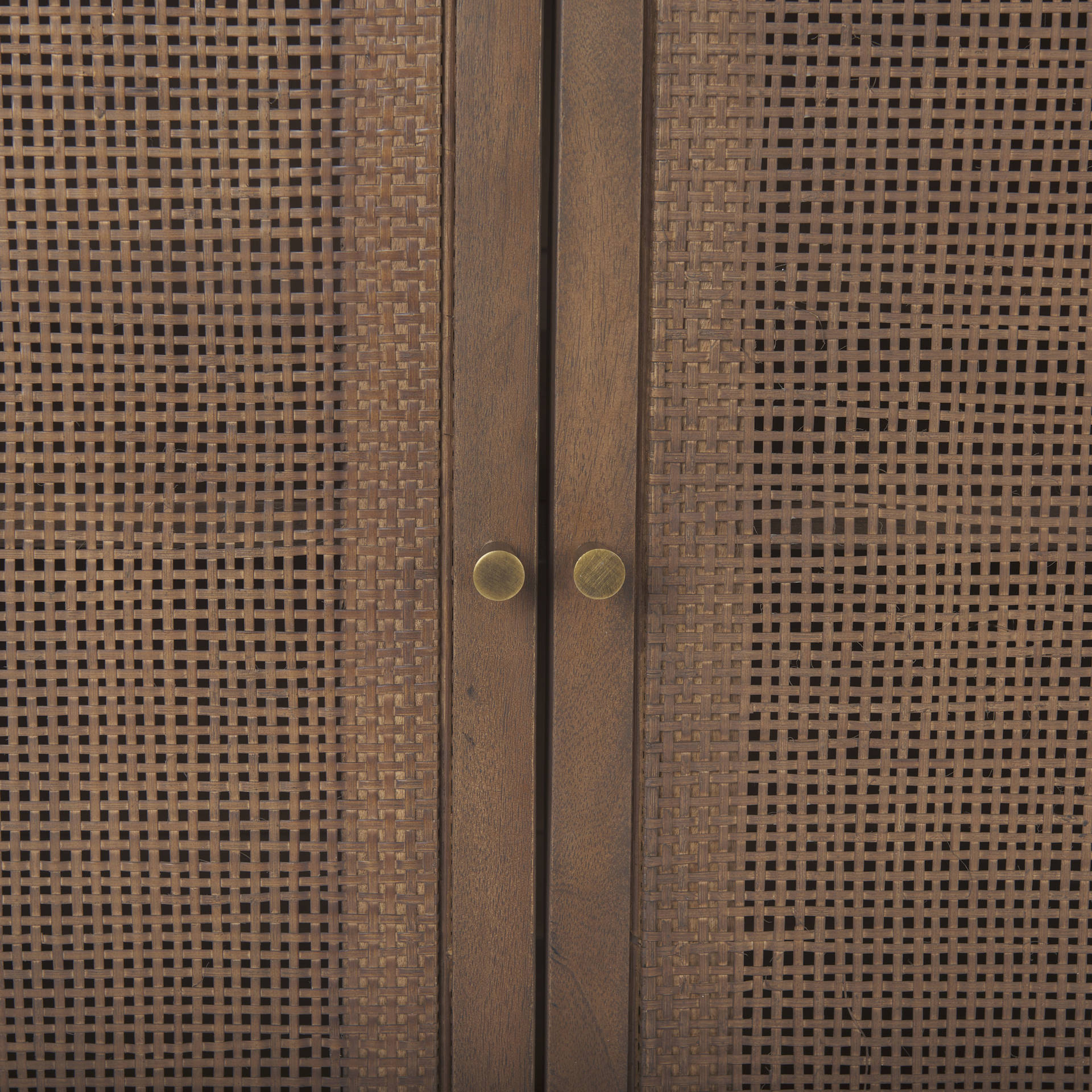 Close up of Grier Medium Brown Solid Wood with Cane Sideboard