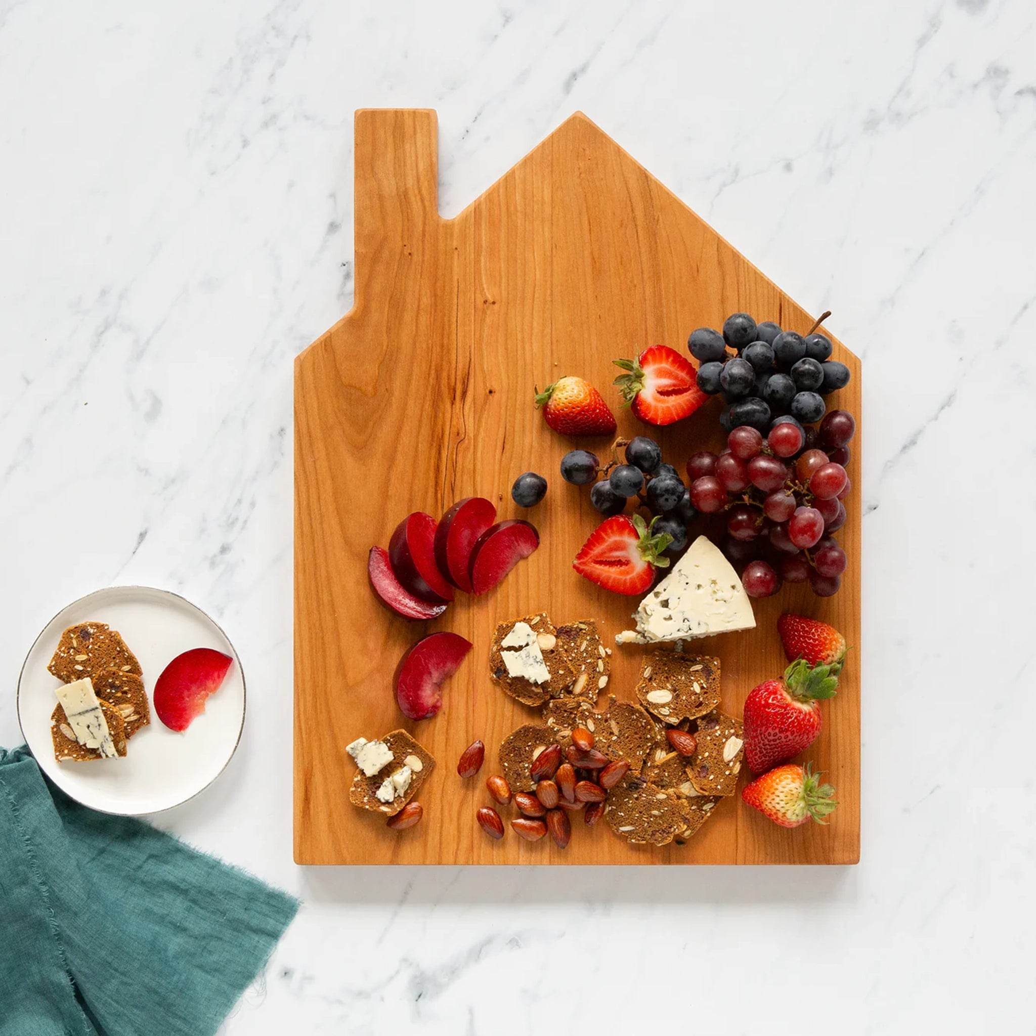 JK Adams Novelty House Shaped Board in Cherry on a marble counter with cheese and crackers 