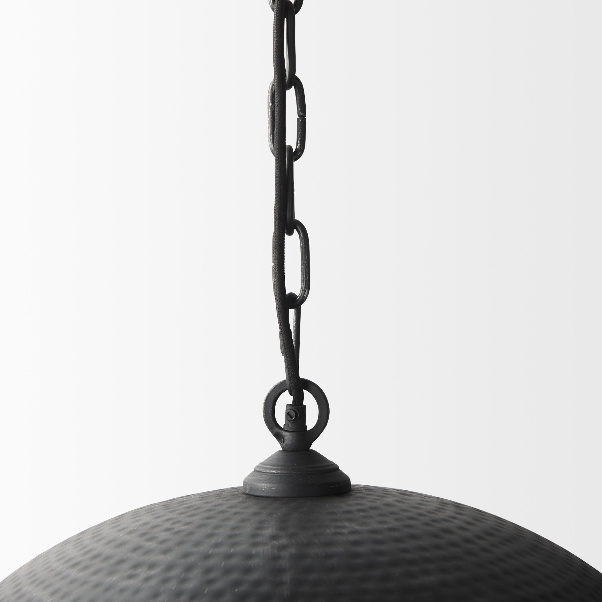 Karina 24" Round Matte Black Hammered Metal Dome Pendant Light on a white background