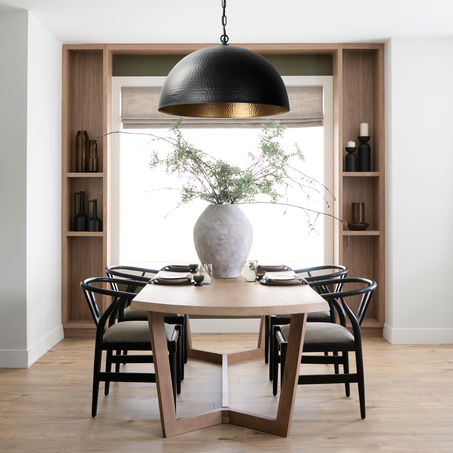 Karina 36" Round Matte Black Hammered Metal Dome Pendant Light in a modern farmhouse dining room