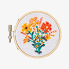 Kikkerland Flowers Cross Stitch Kit on a white background