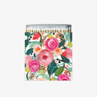 Square box of La Belle Rose Matches by PPD with pink flowers  on a white background