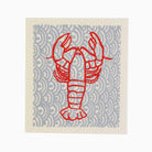 Swedish cloth with red lobster printed on it on a white background