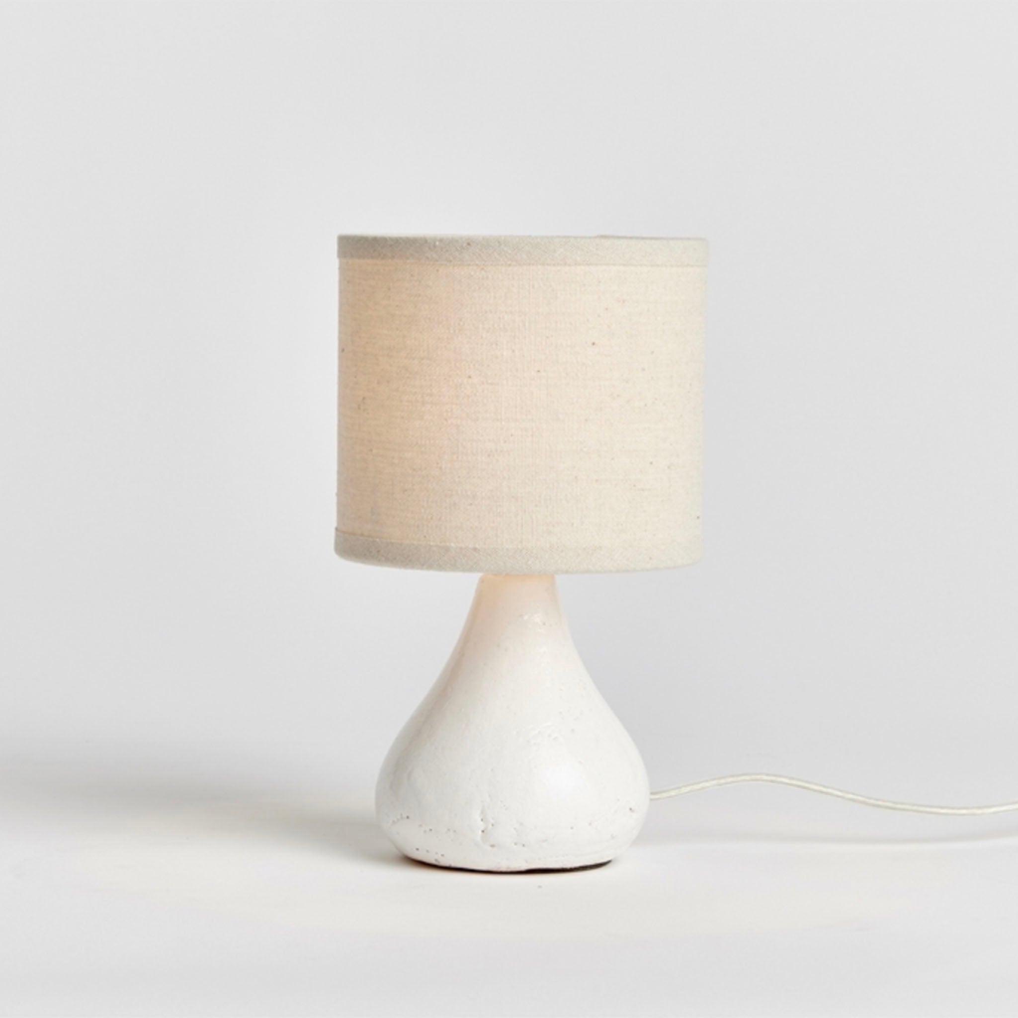 Napa Home and Garden Luka Mini Lamp on a white surface