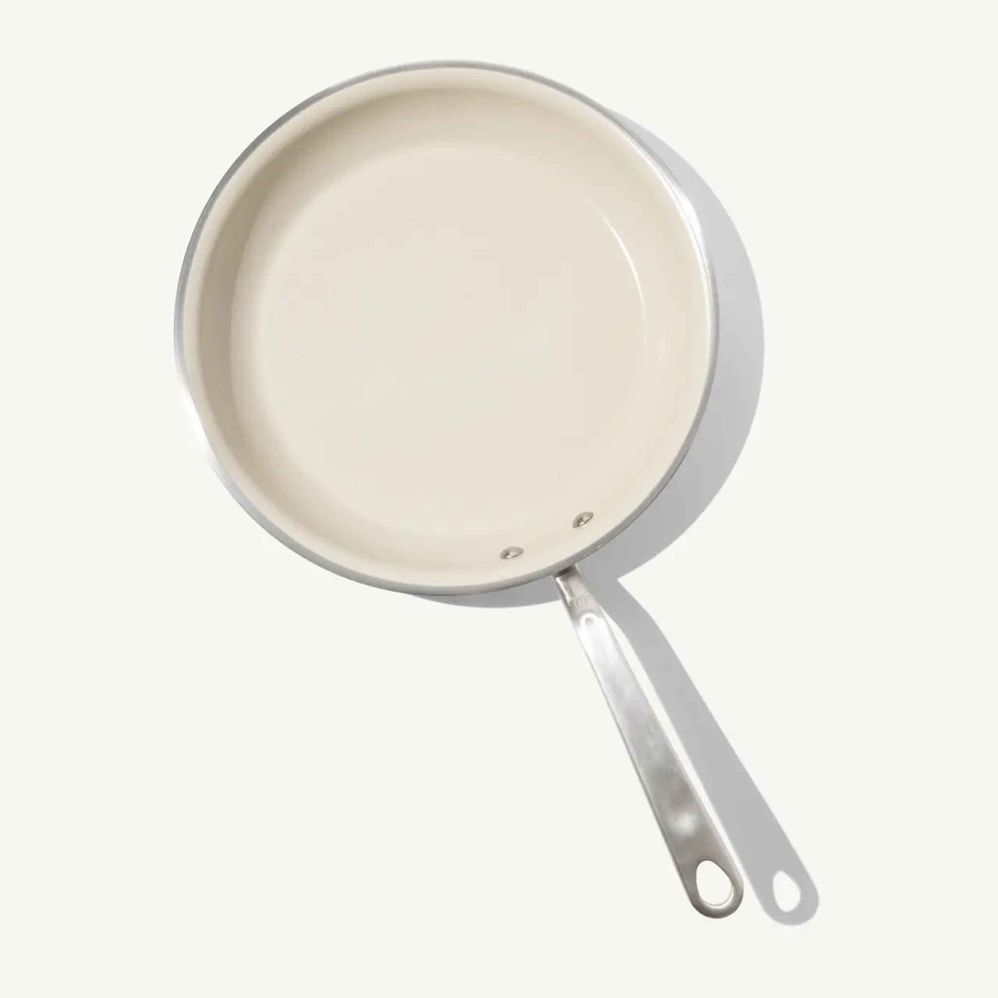 Made In CeramiClad™ 12” Non-stick Fry Pan on a beige background at Addison West