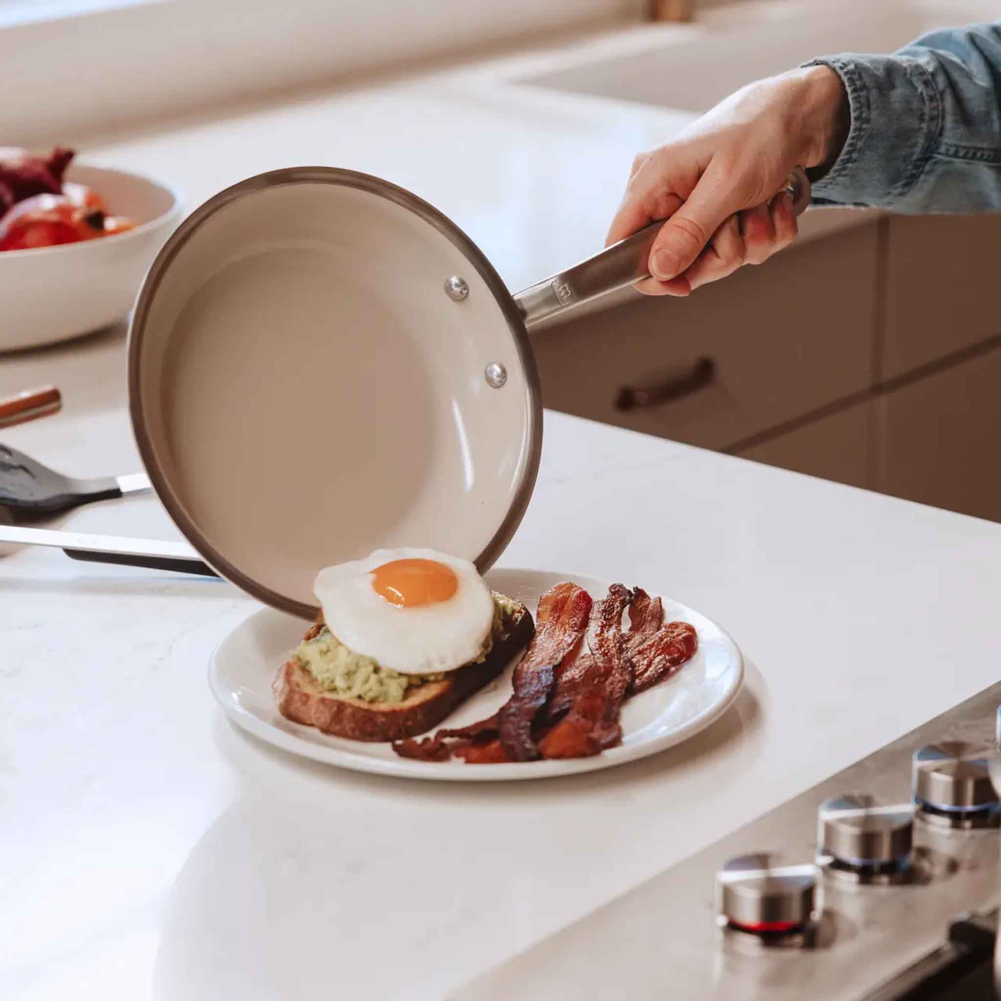 Made In CeramiClad™ 12” Non-stick Fry Pan on a counter with food at Addison West