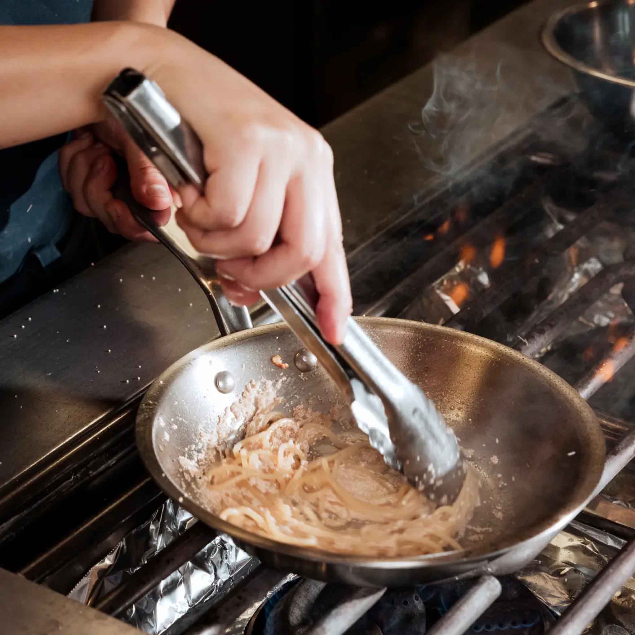 Made In Stainless Clad 10" Fry Pan on a stovetop at Addison West