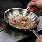 Made In Stainless Clad 8" Fry Pan on a stovetop at Addison West