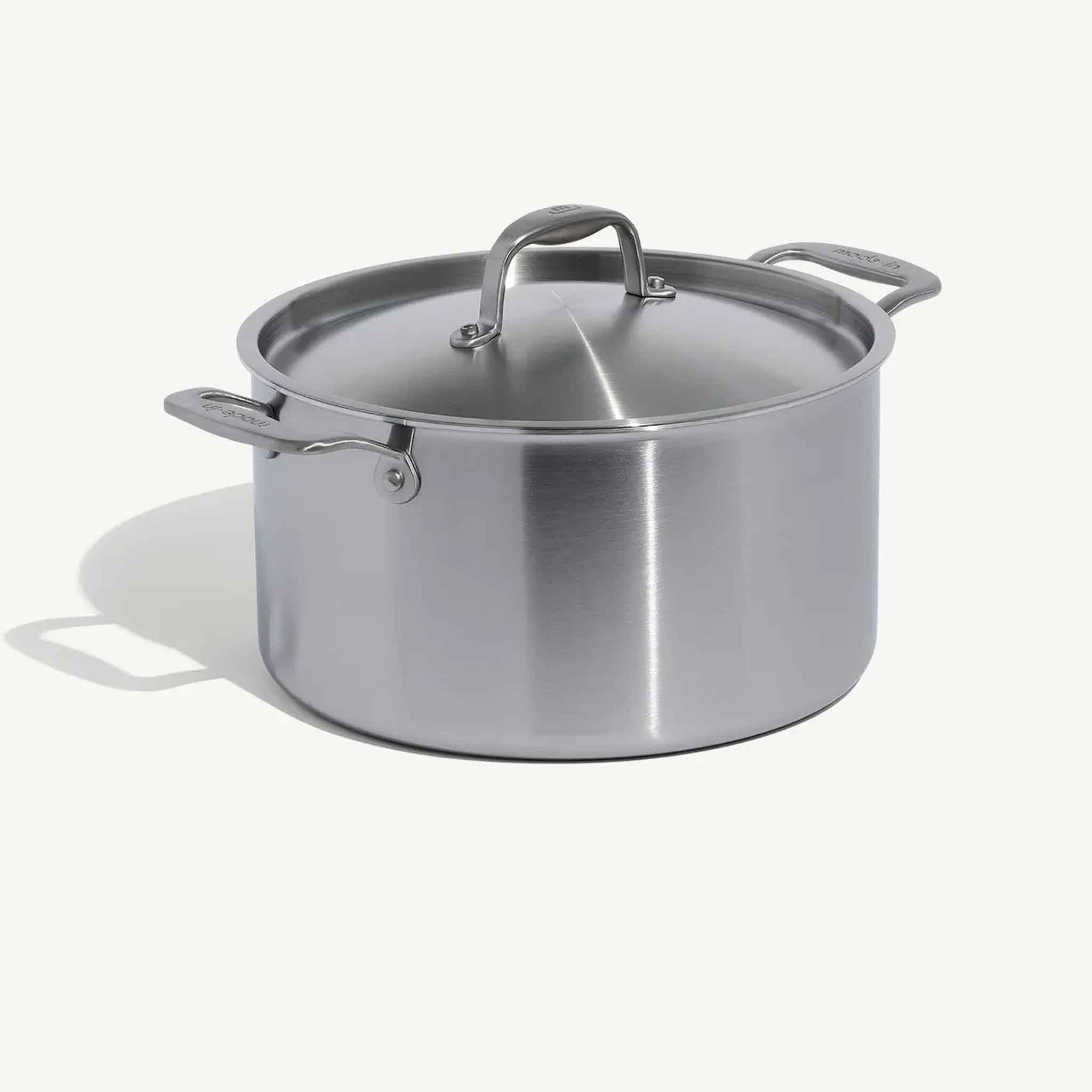 Made In Stainless Clad 8 qt. Stock Pot with Lid on a beige background at Addison West