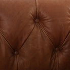 Four Hands furniture brand Maxx Chesterfield style Sofa in Heirloom Sienna leather on a white background