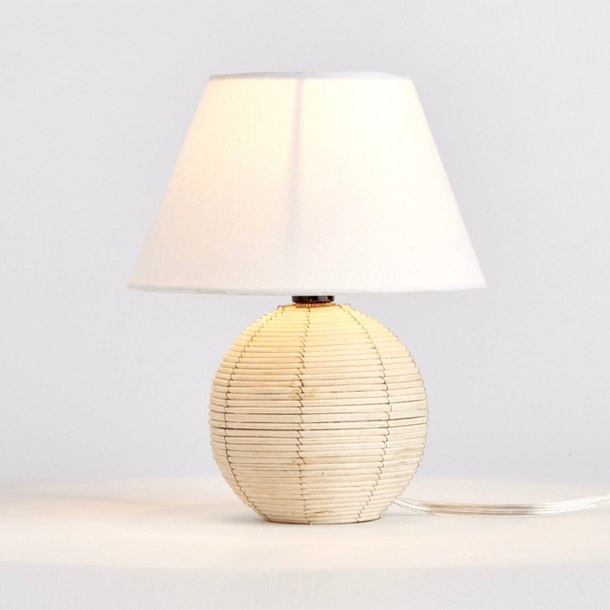 Napa Home and Garden brand Maye Sphere Mini Lamp on a white surface