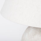 Close up of Mehdi Cream Ceramic Table Lamp on a white background