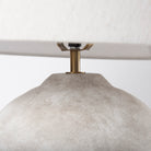 Close up of Mehdi Cream Ceramic Table Lamp on a white background