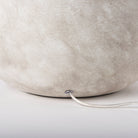 Close up of Mehdi Cream Ceramic Table Lamp on a white background