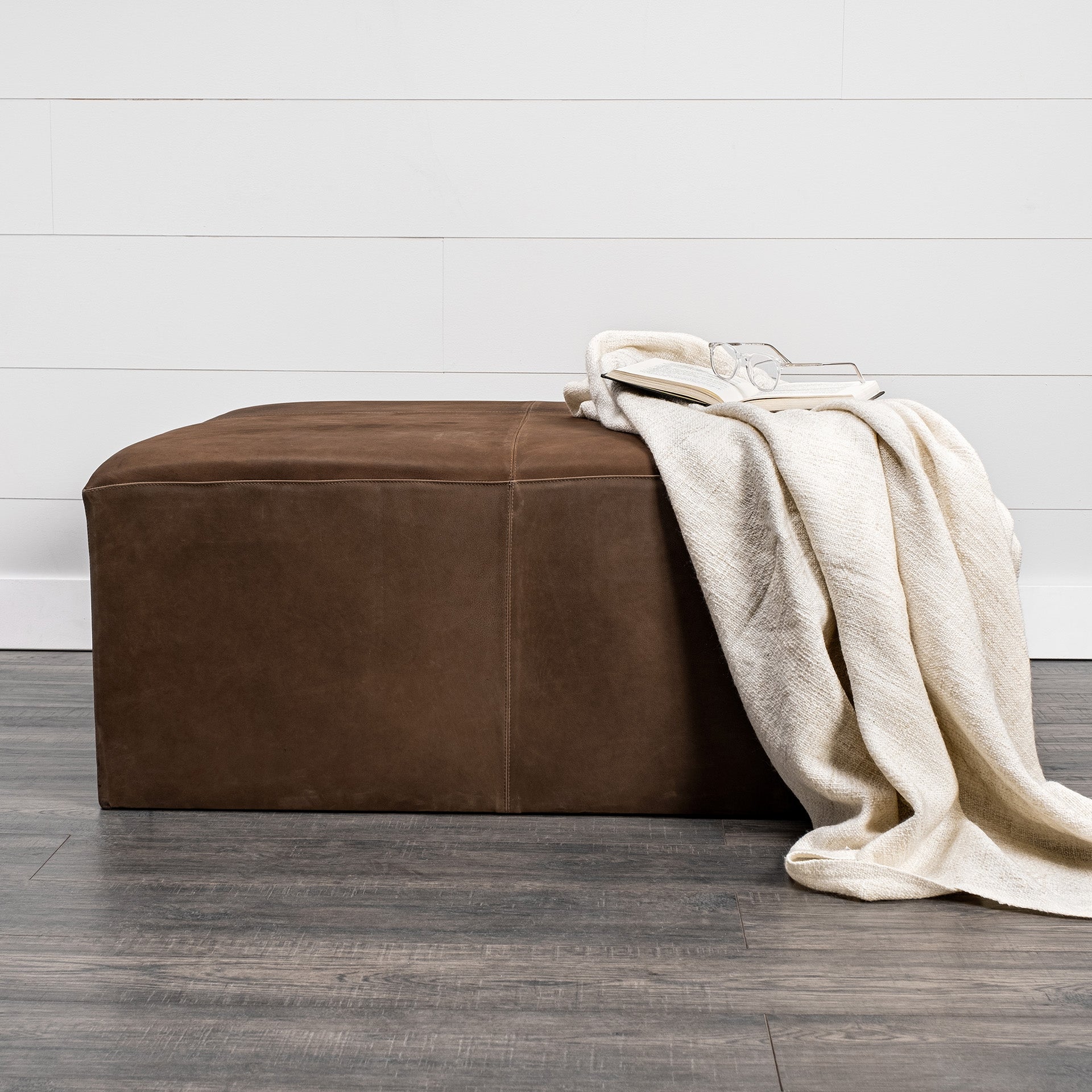 Minara 36" Square Brown Leather Wrapped w/Wood Base Ottoman in a farmhouse living room