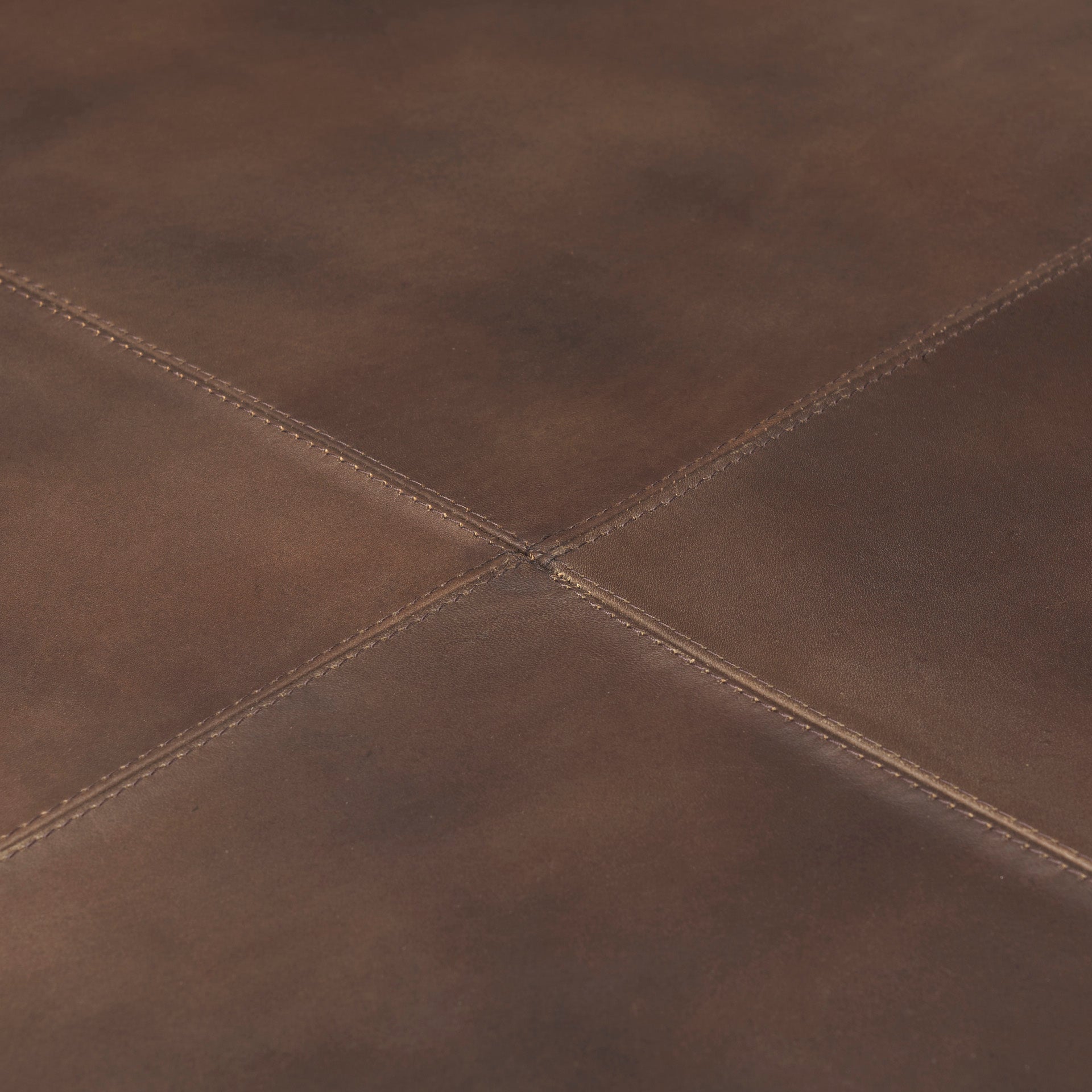 Close up of Minara 36" Square Brown Leather Wrapped w/Wood Base Ottoman