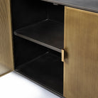 Close up of Newsome II 79Lx16Wx33H Black and Gold Metal 4 Cabinet Door Sideboard on a white background