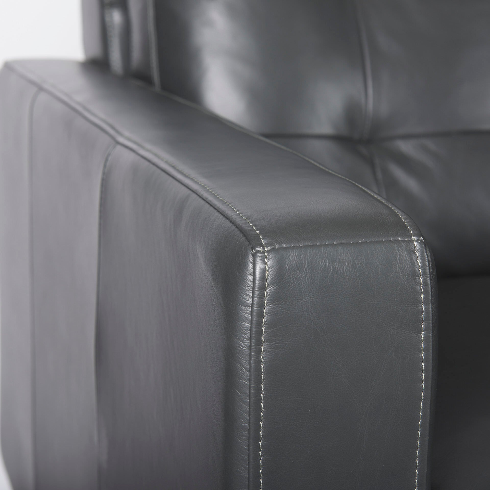 Close up of Olaf Grey Leather Sofa on a white background