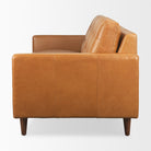 Olaf Tan Leather Sofa on a white background on a white background