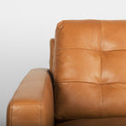 Close up of Olaf Tan Leather Sofa on a white background