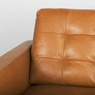 Close up of Olaf Tan Leather Sofa on a white background