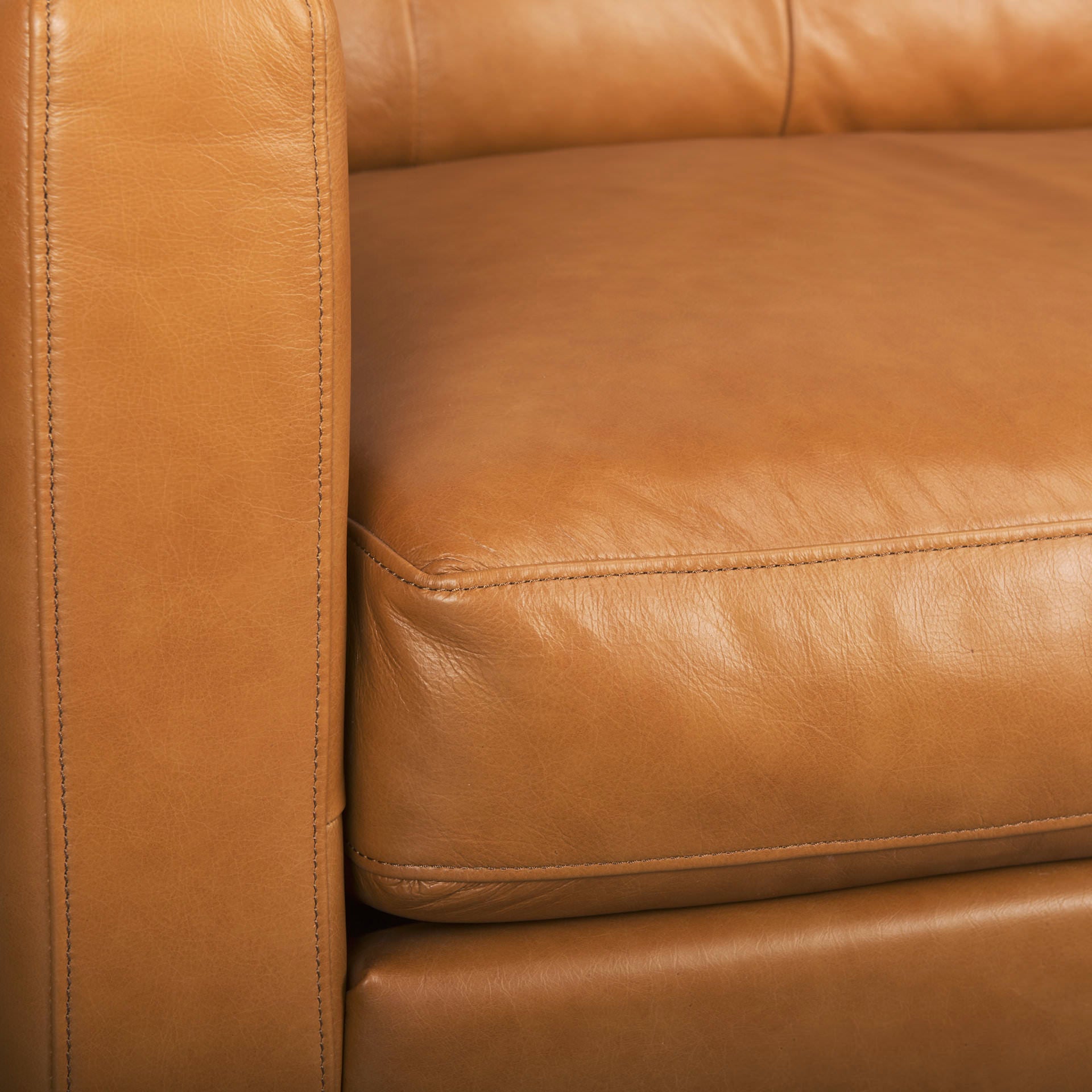 Close up of Olaf Tan Leather Sofa