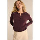 Model wearing Z Supply Outlook Cardigan in Berry Wine in front of a neutral backdrop 